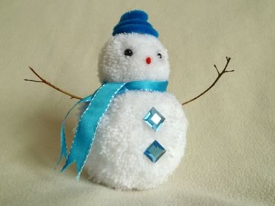 snowman christmas crafts - pom pom snowman in blue hat