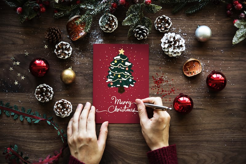 Christmas Greetings mood image writing a card