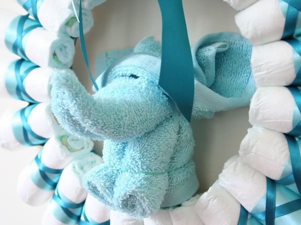 Rolled Diaper Wreath Instructions - Decorated with Washcloth Elephant