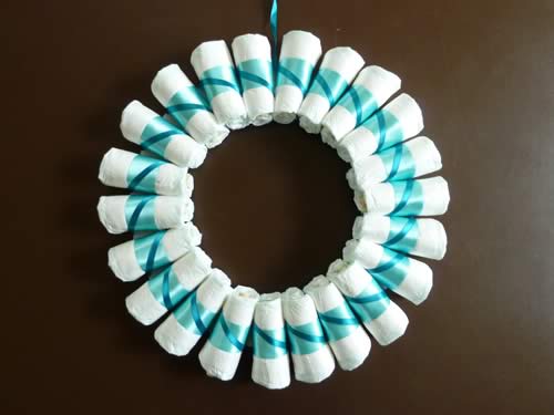 rolled diaper wreath step 4 criss cross wrap