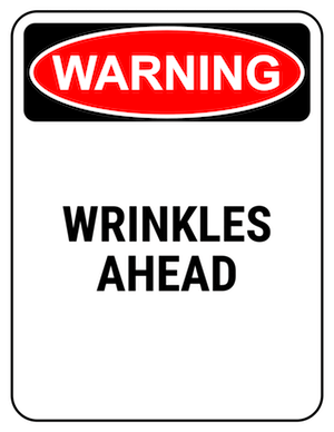 funny safety sign warning wrinkles ahead