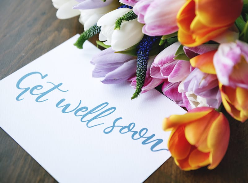 get well wishes mood photo with card and flowers
