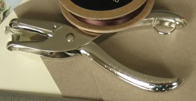 how to make a book hole punch