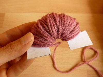 how to make pom poms step 2d