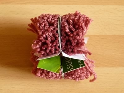 how to make pom poms step 5b
