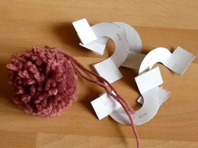 how to make pom poms step 7