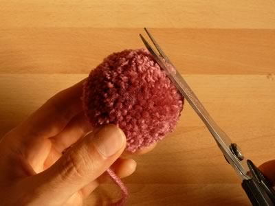 how to make pom poms step 8