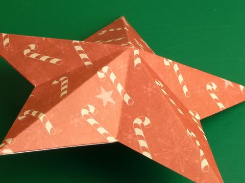 making christmas decorations completed double sided paper star