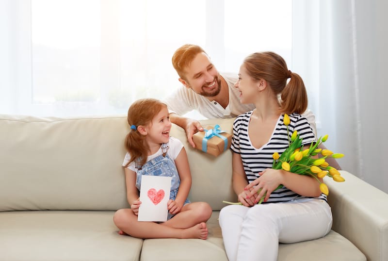 mothers day message to wife happy family on sofa