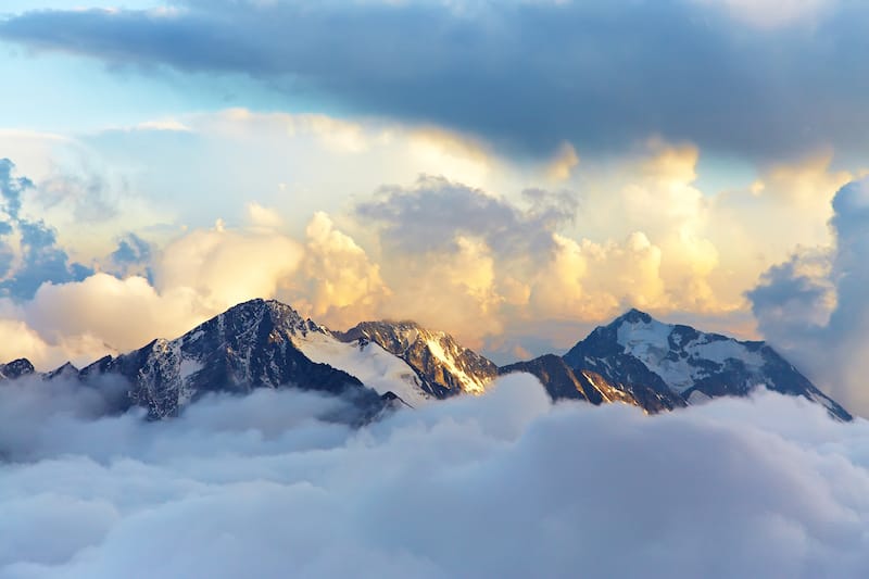 new year bible verses alpine scene with clouds and golden light