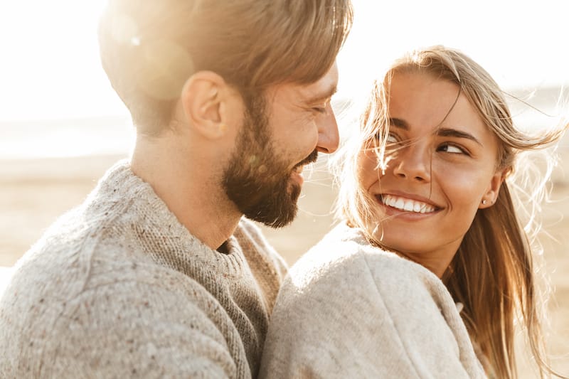 paragraphs for her young couple on beach