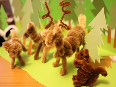 pipe cleaner animals woodland scene with deer and squirrel