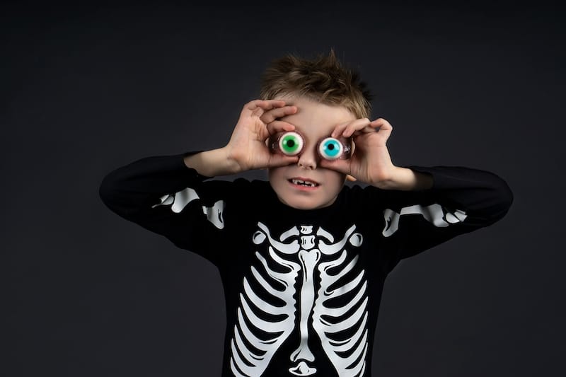 skeleton puns child in skeleton costume