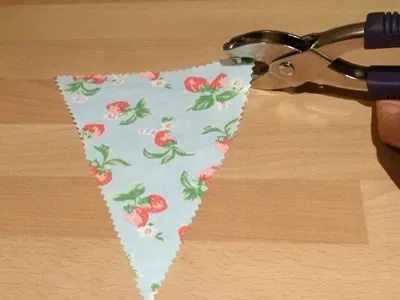 how to make decorative bunting setting eyelets