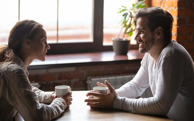 Questions to Ask Your Boyfriend Couple Having Coffee